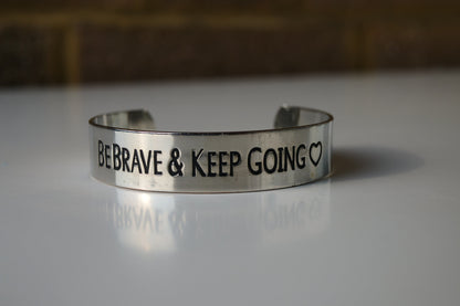 Be Brave and keep Going silver cuff and  charm bracelet