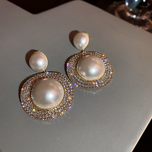 The Rhinestone And Pearl Plated Earrings