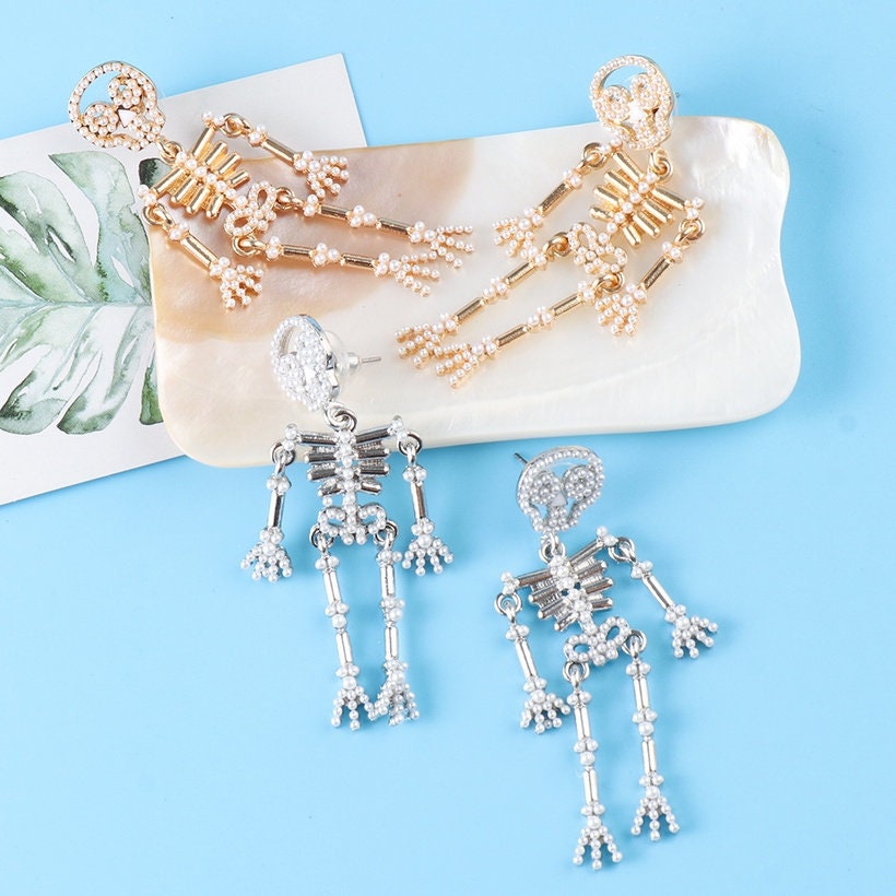 The Shimmering Skeleton Earrings