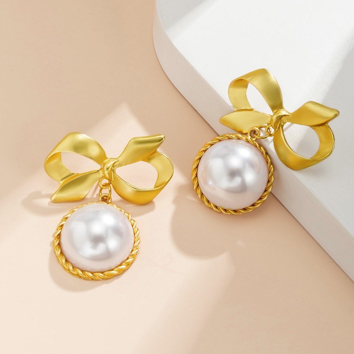 The Gold Bow and Pearl Earring